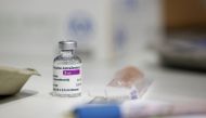 A vial of AstraZeneca coronavirus vaccine is seen at a vaccination centre in Westfield Stratford City shopping centre, amid the outbreak of coronavirus disease (COVID-19), in London, Britain, February 18, 2021. REUTERS/Henry Nicholls/File Photo
