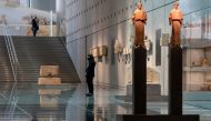 Acropolis Museum employees wear protective face masks, as museums open following the easing of measures against the spread of coronavirus disease (COVID-19), in Athens, Greece, June 15, 2020. REUTERS/Alkis Konstantinidis/File Photo