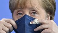 German Chancellor Angela Merkel wears a protective mask after a news conference in Berlin, Germany May 8, 2021. John MacDougall/Pool via REUTERS