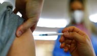 A person receives a dose of the Pfizer-BioNTech COVID-19 vaccine in the Central Mosque in Ehrenfeld suburb, amid the coronavirus disease (COVID-19) pandemic, in Cologne, Germany, May 8, 2021. Reuters/Thilo Schmuelgen
