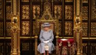 Britain's Queen Elizabeth prepares for her speech in the House of Lord's Chamber during the State Opening of Parliament in London, Britain May 11, 2021. Chris Jackson/Pool via Reuters