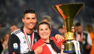 May 19, 2019 Juventus' Cristiano Ronaldo poses with his mother Maria Dolores dos Santos Aveiro as he celebrates winning Serie A with the trophy REUTERS/Massimo Pinca/File Photo