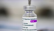 A medical worker fills a syringe with a vaccine at a COVID-19 vaccination center offering the AstraZeneca vaccine, as the number of the coronavirus disease infections decreases in Munich, Germany, May 13, 2021. REUTERS/Andreas Gebert