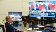 Russian President Vladimir Putin attends an opening ceremony of the Russian-Chinese nuclear energy cooperation project via a video link at the Novo-Ogaryovo state residence outside Moscow, Russia May 19, 2021.