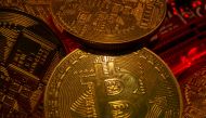 FILE PHOTO: Representations of the virtual currency bitcoin stand on a motherboard in this picture illustration taken May 20, 2021. REUTERS/Dado Ruvic/Illustration/File Photo

