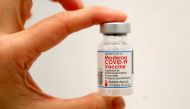 FILE PHOTO: A healthcare worker holds a vial of the Moderna COVID-19 Vaccine at a pop-up vaccination site operated by SOMOS Community Care during the coronavirus disease (COVID-19) pandemic in Manhattan in New York City, New York, U.S., January 29, 2021. 