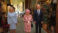 Britain's Queen Elizabeth stands with U.S. President Joe Biden and first lady Jill Biden in the Grand Corridor during their visit at Windsor Castle, in Windsor, Britain, June 13, 2021. Steve Parsons/Pool via REUTERS
