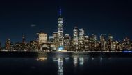 The One World Trade Center is lit in Blue and Gold colors, as New York State celebrates reaching a 70 percent vaccination threshold. Reuters/Eduardo Munoz