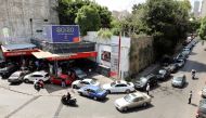 Vehicles stand in line for fuel at a gas station in Beirut, Lebanon on June 10, 2021. (REUTERS/Mohamed Azakir)