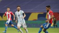 Paraguay's Junior Alonso in action with Argentina's Lionel Messi REUTERS/Henry Romero
 