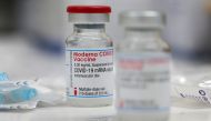 A vial of the Moderna COVID-19 vaccine is seen at a local clinic as the spread of the coronavirus disease continues in Aschaffenburg, Germany, January 15, 2021. REUTERS/Kai Pfaffenbach/File Photo