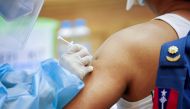 A member of the armed forces in parliament receives the AstraZeneca Covishield coronavirus vaccine in Naypyitaw, Myanmar, January 30, 2021. REUTERS/Thar Byaw/File Photo/File Photo
