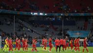 Belgium players after the match Pool via REUTERS/Matthias Hangst