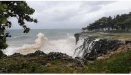 Waters churn along the rocky coastline as Tropical Storm Elsa arrives in Santo Domingo, Dominican Republic July 3, 2021 in this still image taken from social media video. Content filmed July 3, 2021. Eloy Contreras via REUTERS 