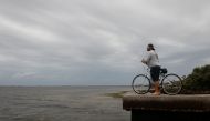 Boat Captain Bernie Vinoski looks on at Bay Vista Park, as Elsa strengthened into a Category 1 hurricane hours before an expected landfall on Florida's northern Gulf Coast, in St. Petersburg, Florida, U.S. July 6, 2021. REUTERS/Octavio Jones