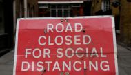 A sign is seen on a road in Covent Garden ahead of a further easing of lockdown restrictions for England on April 12, amid the spread of the coronavirus disease (COVID-19) pandemic, in London, Britain, April 6, 2021. REUTERS/Toby Melville/File Photo