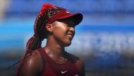 July 25, 2021. Naomi Osaka of Japan celebrates after winning her first round match against Zheng Saisai of China REUTERS/Edgar Su