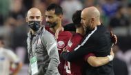 Qatar coach Felix Sanchez celebrates after yesterday's win.