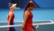 Naomi Osaka of Japan with Marketa Vondrousova of Czech Republic after their third round match REUTERS/Mike Segar