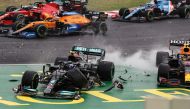 Formula One F1 - Hungarian Grand Prix - Hungaroring, Budapest, Hungary - August 1, 2021 Mercedes' Valtteri Bottas collides with Red Bull's Sergio Perez Pool via REUTERS/Peter Kohalmi
