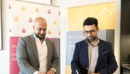 Taimur Ali Mir (right), Director of Professional Qualifications at PwC’s Academy and Zahi Bou Kamel, Senior Manager of Business Development at Wiley, during a signing ceremony recently. 