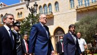 Lebanon's new Prime Minister Najib Mikati walks during an official ceremony to mark his assumption of duties at the Government Palace in Beirut, Lebanon September 13, 2021. Dalati Nohra