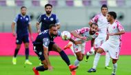Action during the QSL match between Al Shamal and Qatar SC