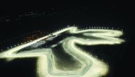 An aerial view of the floodlit Losail International Circuit.