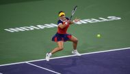 Bianca Andreescu (CAN) hits a shot against Alison Riske (USA) at Indian Wells Tennis Garden. Mandatory Credit: Orlando Ramirez-USA TODAY Sports