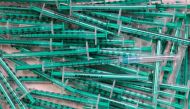 Empty syringes are pictured after a coronavirus disease (COVID-19) vaccination at a doctor's office in Berlin, Germany, November 2, 2021. REUTERS/Hannibal Hanschke/File Photo