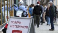 People queue outside a COVID-19 rapid test centre to get a day pass to visit shops and cultural institutions, as the spread of the coronavirus disease (COVID-19) continues in Weimar, Germany, March 29, 2021. REUTERS/Karina Hessland
