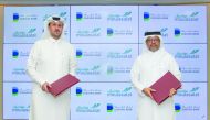 Talal Ahmed Al Khaja, Chief Marketing & Communications Officer at Dukhan Bank (left) and Ahmed Al Muftah, CAO at Mowasalat (Karwa) during the launch of the initiative in Doha. 