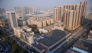FILE PHOTO: A general view shows the Huanan Wholesale Seafood Market, where the first cluster of cases of the coronavirus disease (COVID-19) emerged, in Wuhan, Hubei province, China, January 15, 2021. REUTERS/Thomas Peter/File Photo
