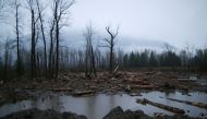 Floodwater and debris are seen at the site of a landslide on Highway 7 near Hope, after rainstorms caused flooding and landslides across British Columbia, Canada November 18, 2021. REUTERS/Jesse Winter