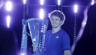 Germany's Alexander Zverev celebrates with trophy after winning his final match against Russia's Daniil Medvedev REUTERS/Guglielmo Mangiapane
