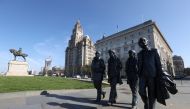 A statue of the Beatles is seen in Albert Dock as the spread of the coronavirus disease (COVID-19) continues, Liverpool, Britain, April 14, 2020. REUTERS/Carl Recine/File Photo
 