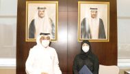 Minister of Public Health H E Dr. Hanan Mohamed Al Kuwari and Minister of Labour H E Dr. Ali bin Samikh Al Marri during signing of the MoU.
