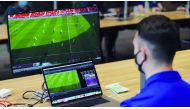 An official analyses a game during the FIFA Arab Cup.
