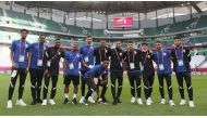 Qatar players pose for a photo. 