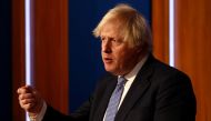 British Prime Minister Boris Johnson holds a news conference for the latest coronavirus disease (COVID-19) update in the Downing Street briefing room, in London, Britain December 8, 2021. Adrian Dennis/Pool via REUTERS/File Photo