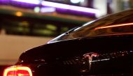 A Tesla logo is seen on a Parisian taxi car in Paris, France, December 14, 2021. REUTERS/Sarah Meyssonnier


