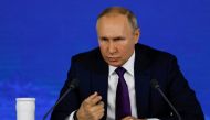 Russian President Vladimir Putin speaks as he attends his annual end-of-year news conference in Moscow, Russia, December 23, 2021. REUTERS/Evgenia Novozhenina
