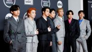 V, Suga, Jin, Jungkook, RM, Jimin and J-Hope of BTS arrive at the 2021 American Music Awards at the Microsoft Theater in Los Angeles, California, U.S., November 21, 2021. REUTERS/Aude Guerrucci/File Photo