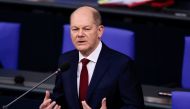 German Chancellor Olaf Scholz speaks during his first questioning session with lawmakers at the lower house of parliament Bundestag in Berlin, Germany, January 12, 2022. REUTERS/Hannibal Hanschke
