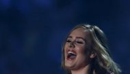 British singer Adele receives her award for British Album of the Year at the BRIT Awards at the O2 arena in London, Britain, February 24, 2016. REUTERS/Stefan Wermuth EDITORIAL USE ONLY/File Photo