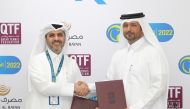 Qatar Tennis, Squash and Badminton Federation's Secretary General Tariq Darwish Zainal and Masraf Al Rayan's Group Chief of Human Resources Hamad Al Kubaisi shake hands during the sponsorship agreement signing ceremony, yesterday. Pic: Salim Matramkot/The Peninsula