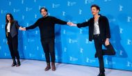 Director Isaki Lacuesta and cast members Noemie Merlant and Nahuel Perez Biscayart attend a photocall to promote the movie 'Un ano, una noche' (One Year, One Night) at the 72nd Berlinale International Film Festival in Berlin, Germany, February 14, 2022. Reuters/Hannibal Hanschke