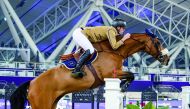 Swedish World No. 1 Peder Fredricson guides Hansson WL (SWB) over a hurdle at the Longines Arena at Al Shaqab during last week's Commercial Bank CHI Al Shaqab presented by Longines.