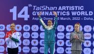 Uzbekistan’s Oksana Chusovitina celebrates on the podium.