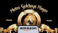 Smartphone with Amazon logo is seen in front of displayed MGM logo in this illustration taken, May 26, 2021. Reuters/Dado Ruvic/Illustration/File Photo